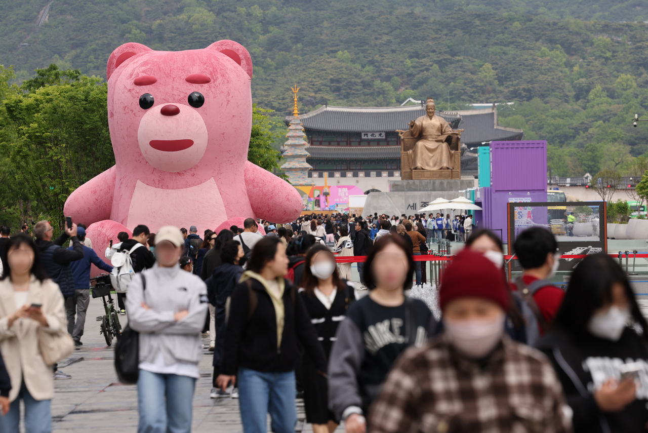 A tall, pink teddy bear known as “Bellygom” is displayed at the Gwanghwamun Plaza in central Seoul, the main event venue of “Seoul Festa 2023” (Seoul Metropolitan Government)