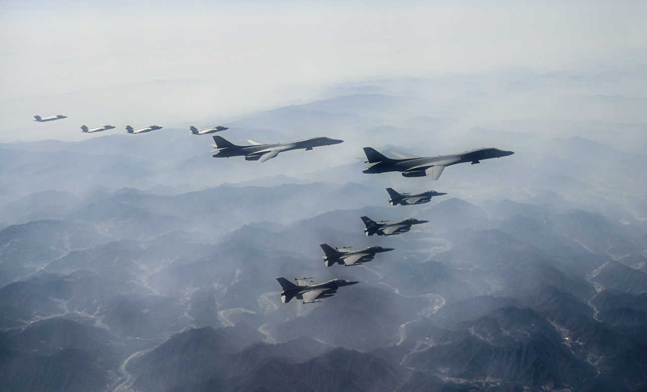 South Korea and the US conduct a combined aerial exercise in conjunction with the deployment of US B-1B strategic bombers over South Korea on March 19. Combined flight operations provide the US and its allies the opportunity to improve interoperability and demonstrate a combined defense capability. (US Air Force)