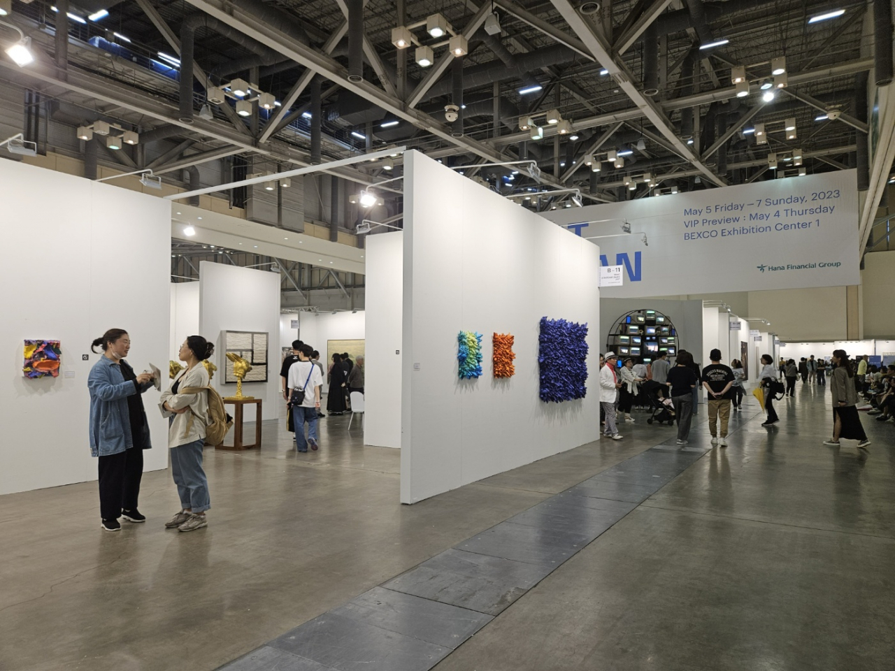 People visit Art Busan 2023 on Friday, the first public day of the art fair, at Bexco in Busan. (Park Yuna/The Korea Herald)