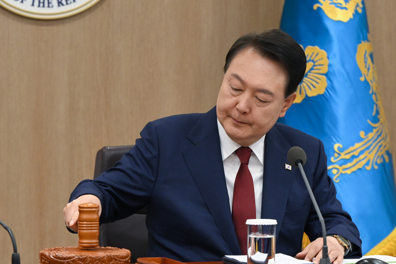 President Yoon Suk Yeol at his weekly Cabinet meeting at the presidential office in Seoul on Tuesday. (Yoon’s office)