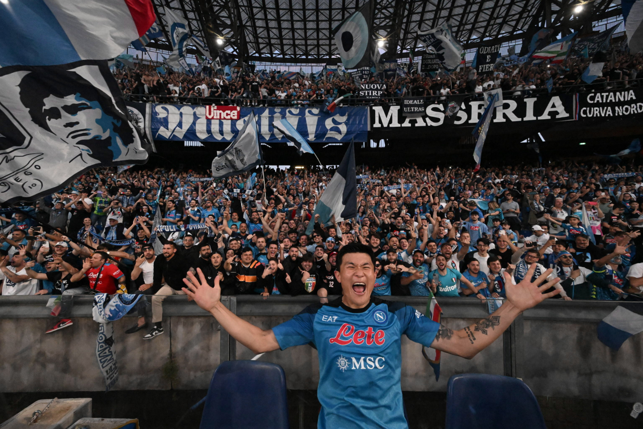 Kim Min-jae of Napoli celebrates with fans after a 1-0 win over ACF Fiorentina at Stadio Diego Armando Maradona in Naples, Italy, on Sunday. (EPA)