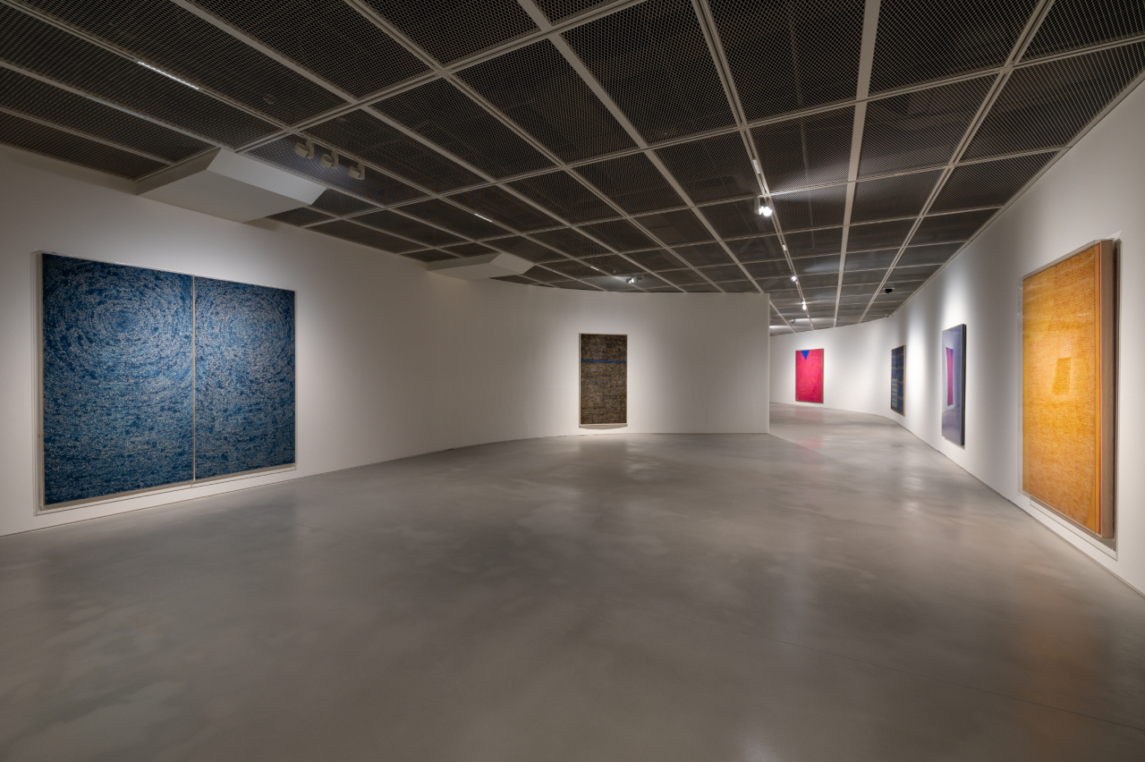 Kim Whan-ki's dense dot paintings are on display at the second part of the exhibition 