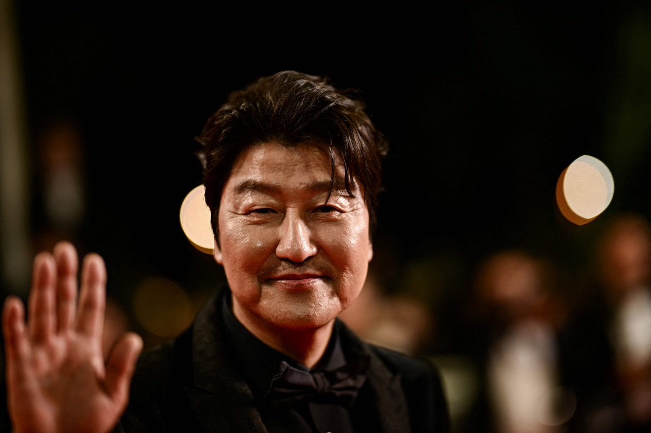 Actor Song Kang-ho poses for a photo on the red carpet for “Cobweb” at the 76th Cannes Film Festival on Thursday. (Yonhap-AFP)