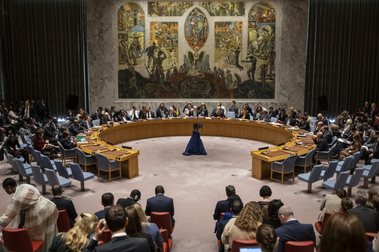 Swiss Federal President Alain Berset (center) chairs a Security Council Open Debate on the security and dignity of civilians in conflict at the UN headquarters in New York on May 23. (EPA-Yonhap)