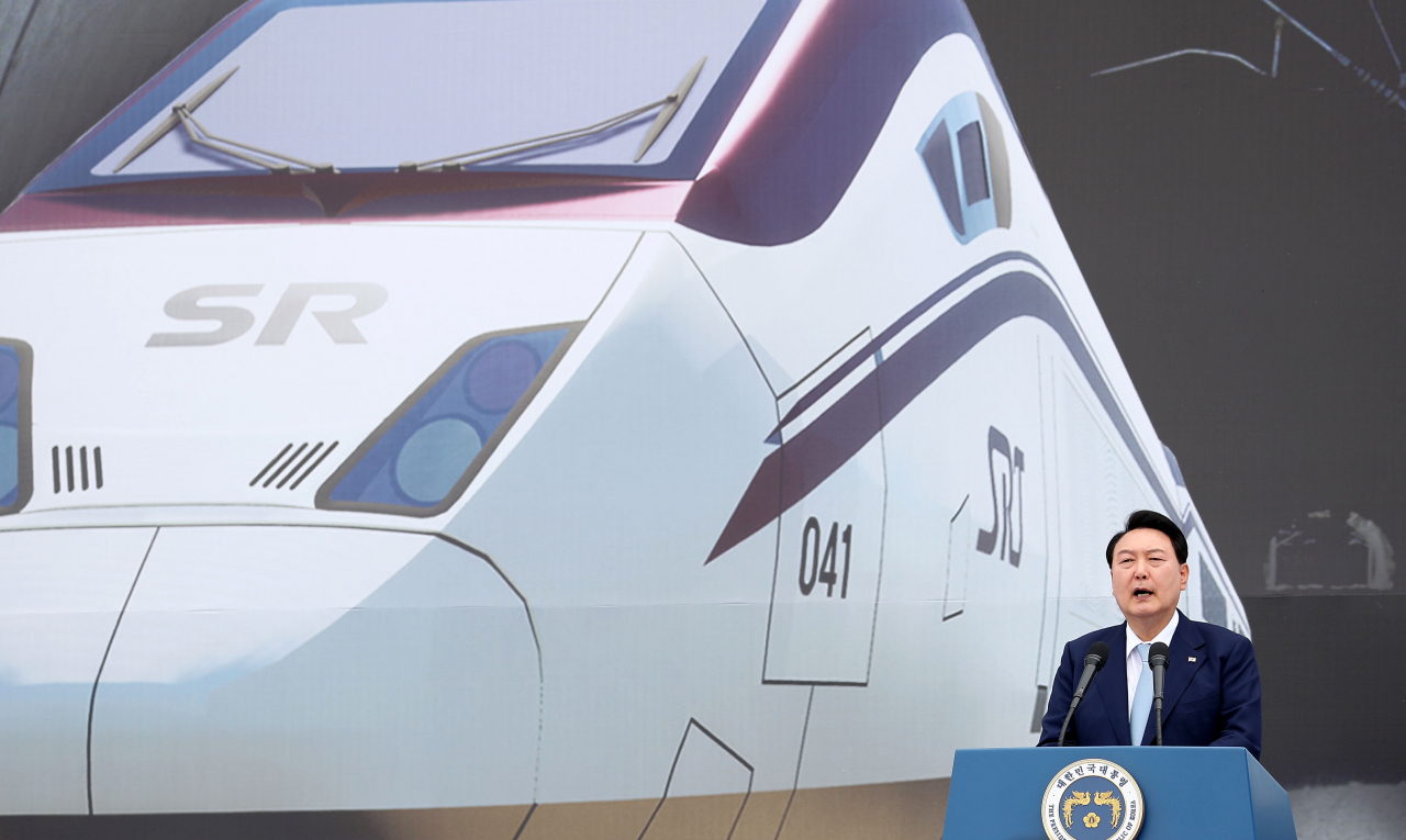 President Yoon Suk Yeol speaks at the groundbreaking ceremony of a double-track high-speed railway connecting Pyeongtaek in Gyeonggi Province and Osong in North Chungcheong Province, on Wednesday. (Yonhap)