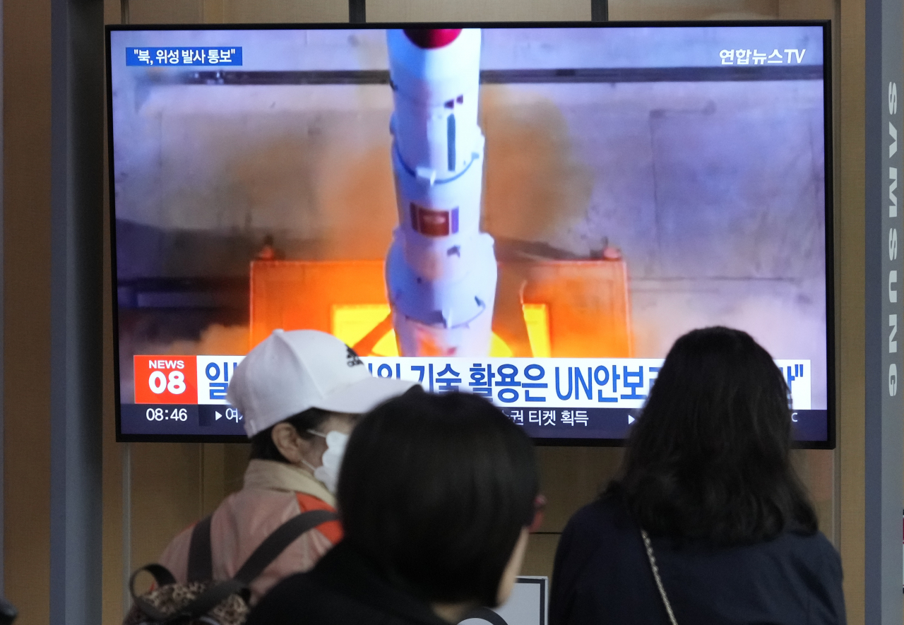 A TV screen shows a North Korean rocket launch during a news program at the Seoul Railway Station in Seoul, South Korea, Monday, May 29. (AP)