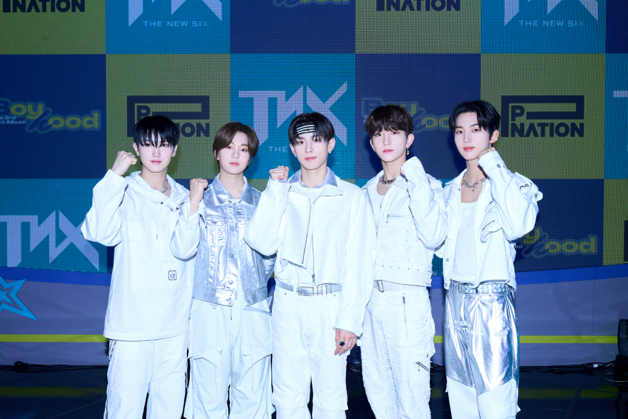 The New Six members pose for a picture at their press conference for their third EP, 