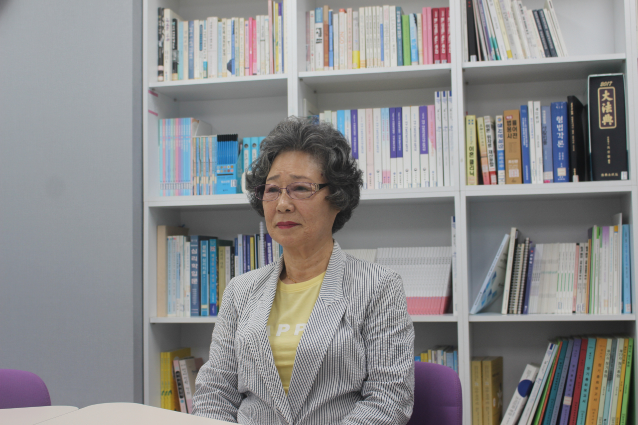Choi Mal-ja sits for an interview with The Korea Herald on June 5 at the Busan office of the civic group, Korea Women's Hot-Line (Yoon Min-sik/The Korea Herald)