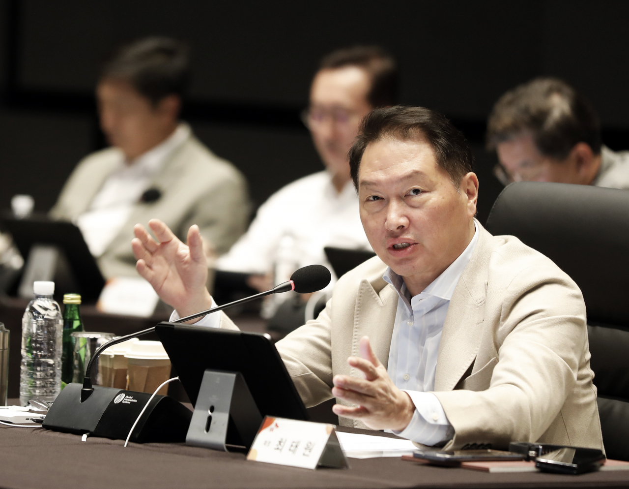 SK Group Chairman Chey Tae-won delivers a keynote speech during the 2023 Extended Management Meeting held in a Seoul hotel on Thursday. (SK Group)