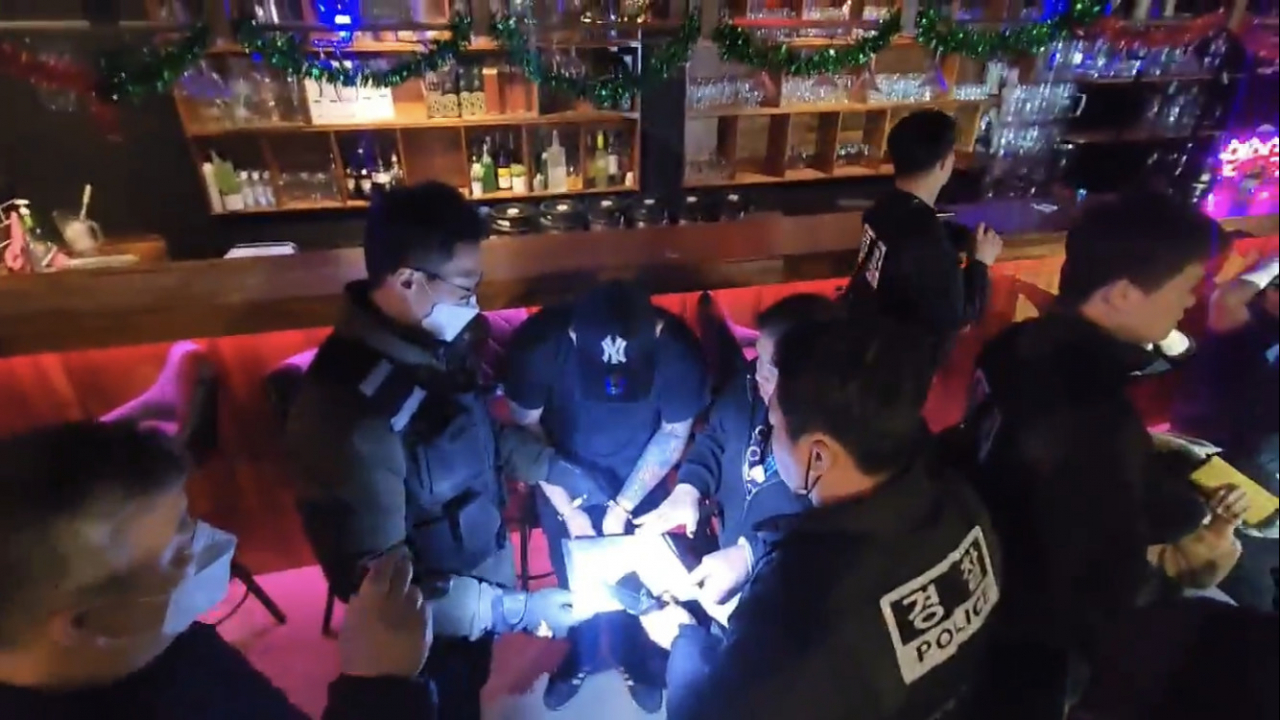 This undated photo provided by the North Gyeongsang Police Agency shows police officers conducting a crackdown on drug offenses. (The North Gyeongsang Police Agency)