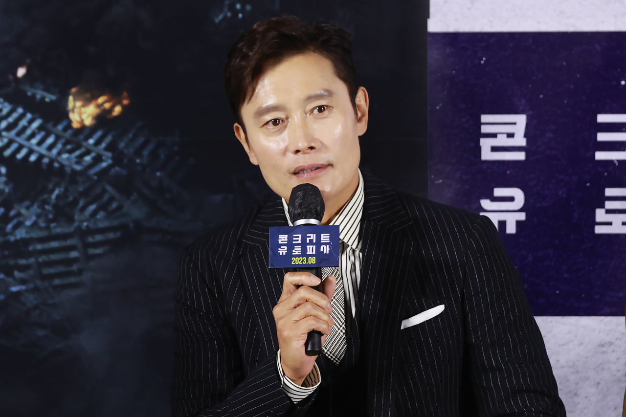 Actor Lee Byung-hun of “Concrete Utopia” speaks during a press conference held at Lotte Cinema Konkuk University, Seoul, Wednesday. (Yonhap)