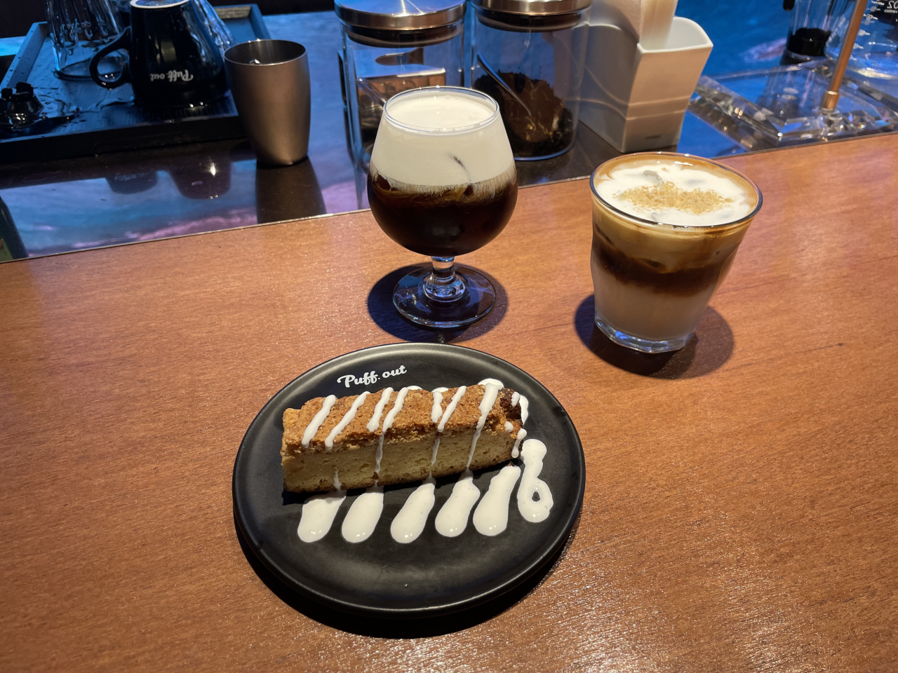 Clockwise from top: Cafe Puff Out's signature honey marron, puff nut latte and lotus butter bar (Kim Da-sol/The Korea Herald)