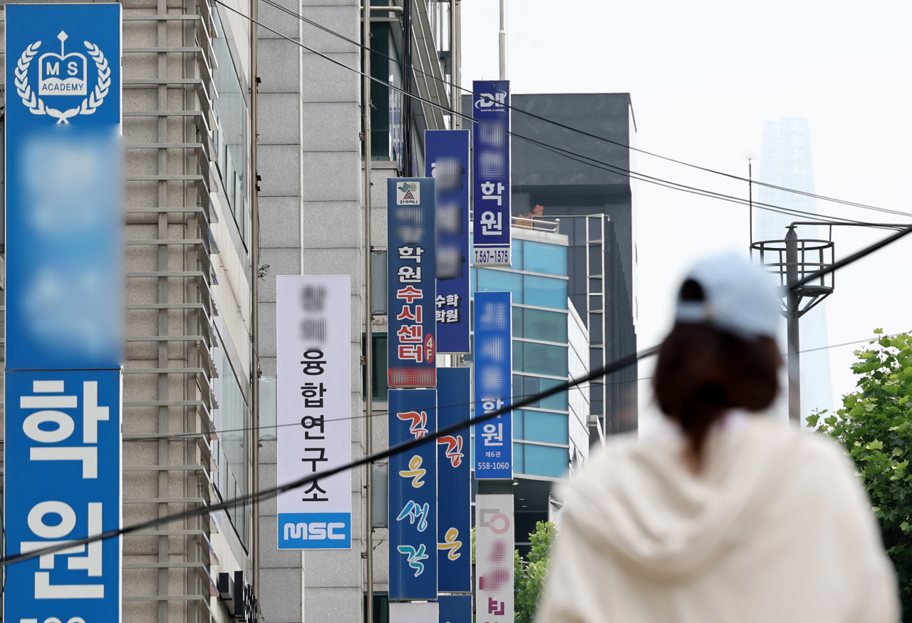 Buildings covered with hagwon signs in Daechi-dong, the private education mecca of South Korea, in Gangnam-gu, Seoul. (Yonhap)