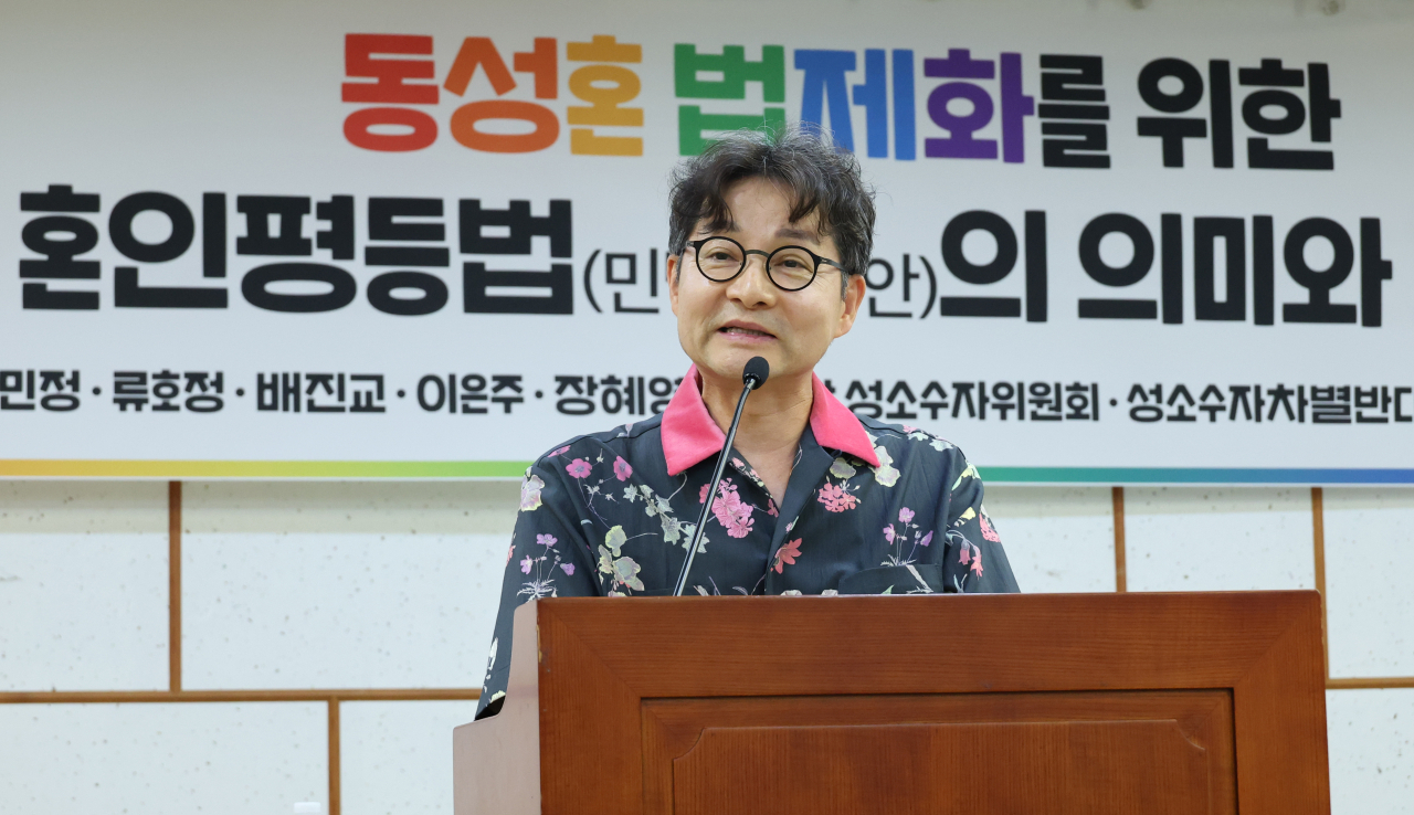 Kim-Jho Gwang-soo, an openly LGBTQ+ film director, speaks at a discussion forum on a set of bills to legalize same-sex marriage, at the National Assembly on June 7. (Yonhap)