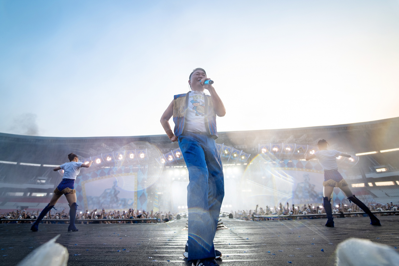 Psy kicks off his concert at the Jamsil Olympic Stadium in Seoul on Friday. (P Nation)