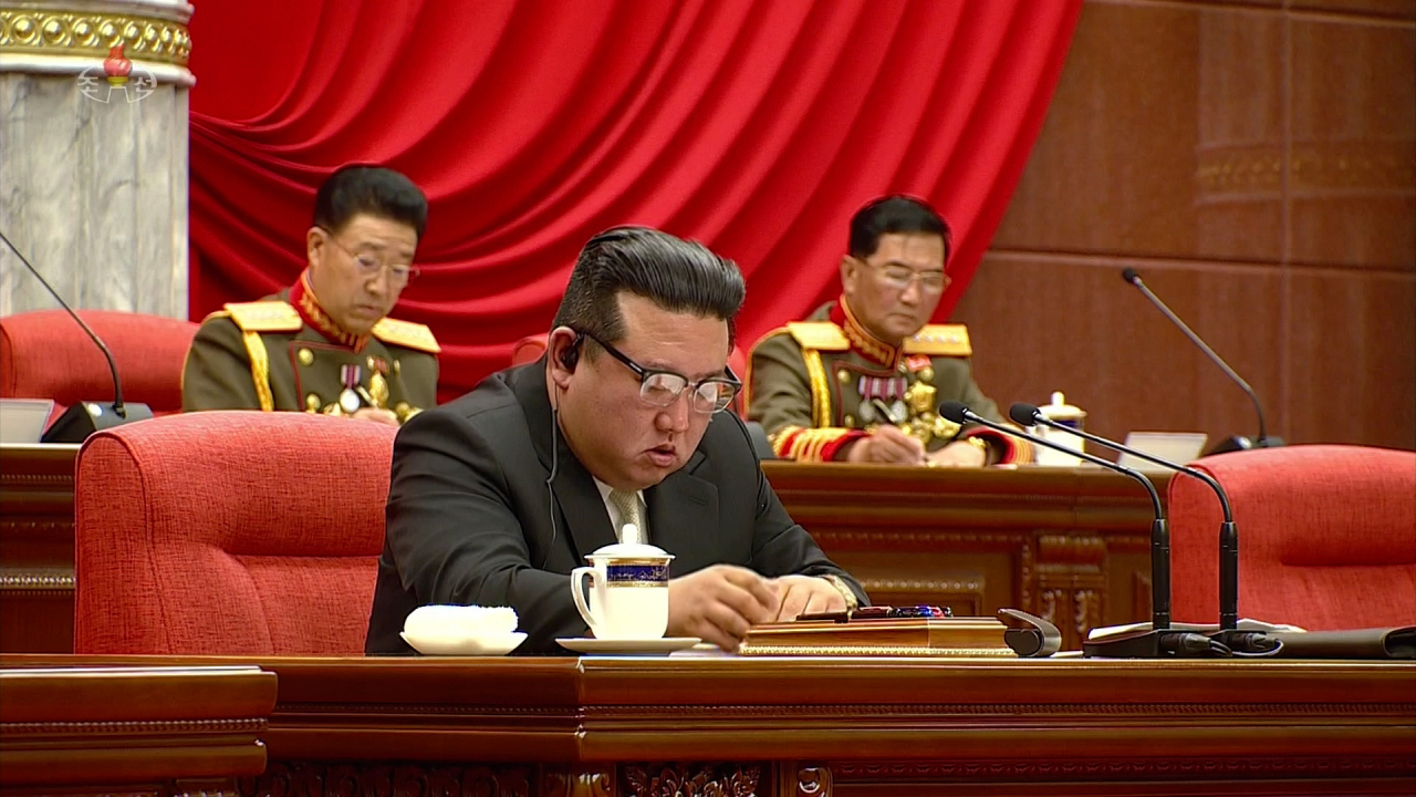 This photo from June 19 shows leader Kim Jong-un attending a key party meeting. (KCTV)