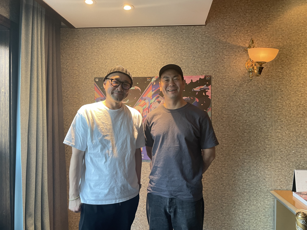 Japanese filmmakers Uchida Eiji (left) and Katayama Shinzo pose for a photo during an interview with The Korea Herald on July 2. (Kim Da-sol/The Korea Herald)