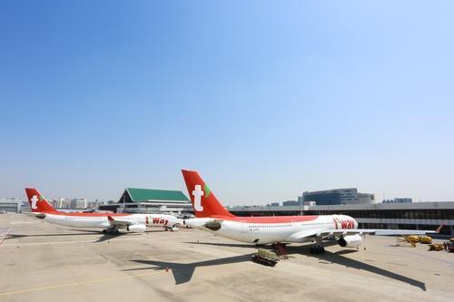 This photo shows its A330-300 chartered planes at Incheon International Airport, west of Seoul. (T'way Air)