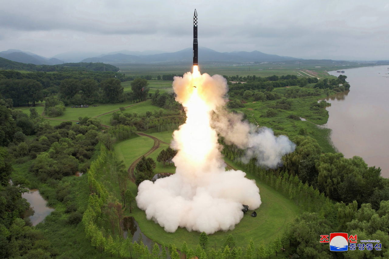 North Korea fires a Hwasong-18 solid-fuel intercontinental ballistic missile (ICBM) on Wednesday in this photo released by North Korea's state-run Korean Central News Agency. (Yonhap)
