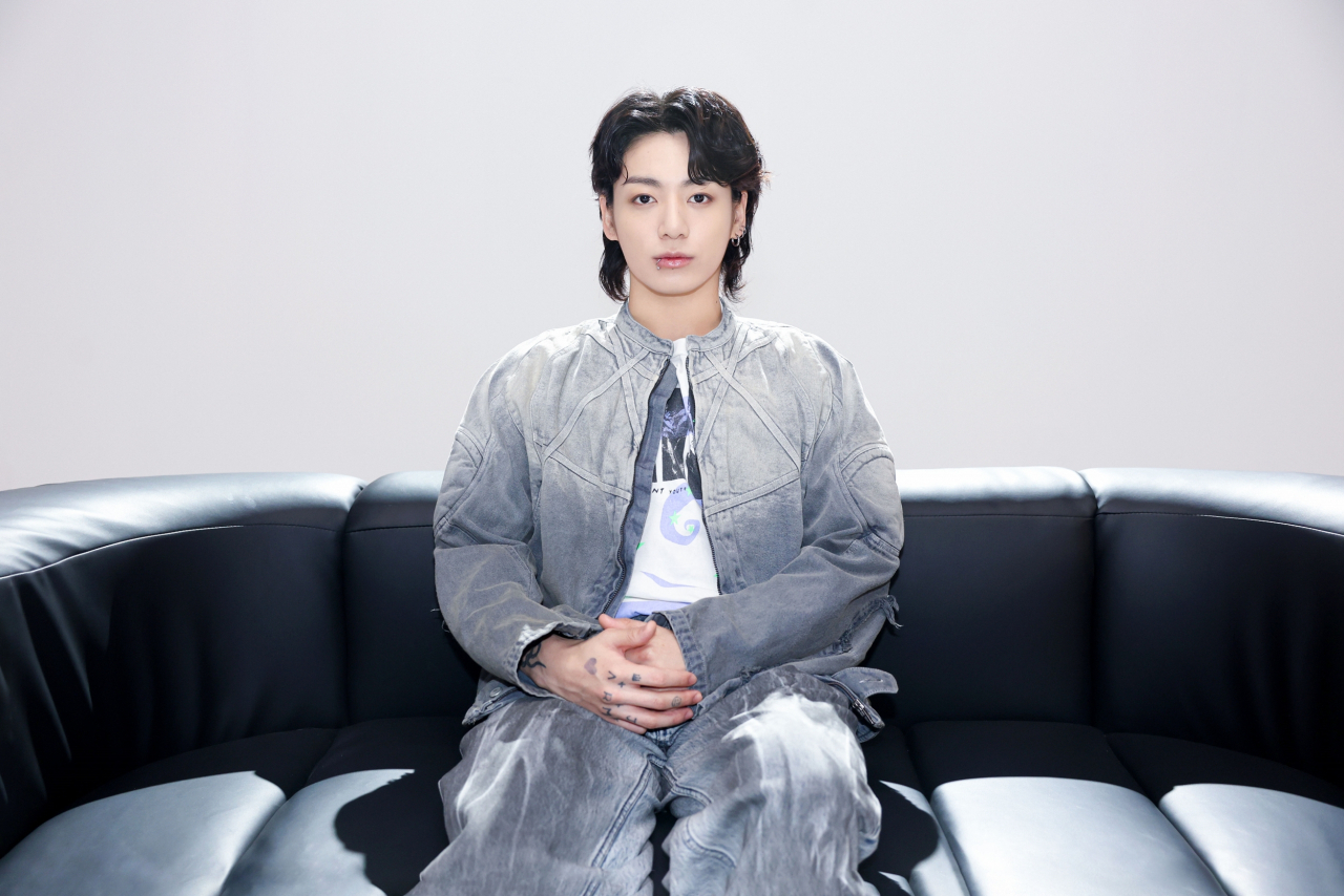 Jungkook shares a pre-recorded video introducing his solo single, 