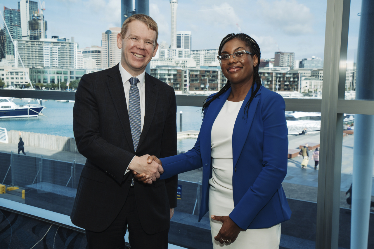 British Trade Minister Kemi Badenoch (right) meets New Zealand Prime Minister Chris Hipkins (left) during the Trans-Pacific Partnership (TPP) Ministerial Meeting in Auckland, New Zealand, Sunday. (AP)