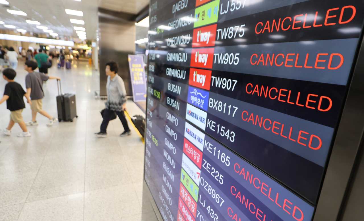 An arrival board at Jeju International Airport on the southern Jeju Island shows canceled flights on Aug. 9, 2023, due to the approaching Typhoon Khanun. (Yonhap)