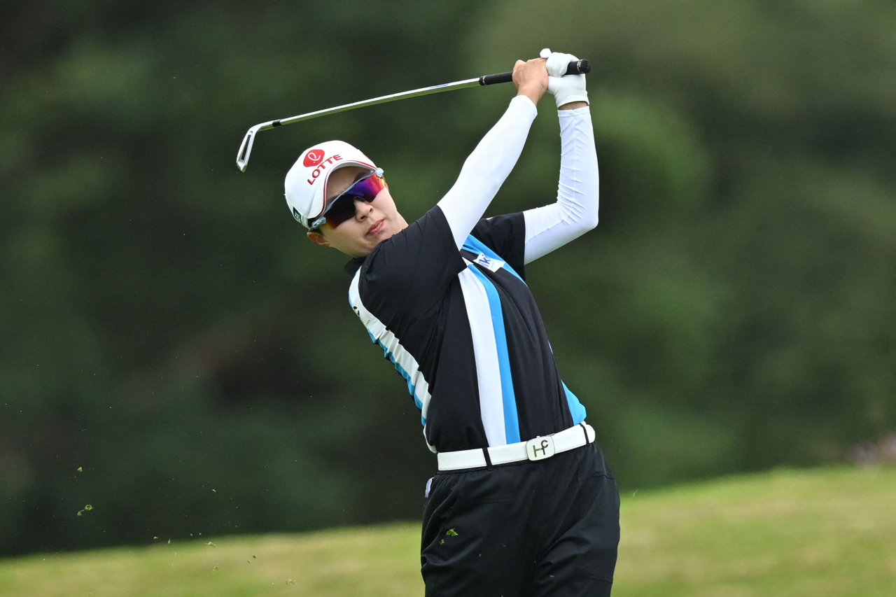 South Korea's Kim Hyo-joo watches her approach shot from the 18th fairway on day 2 of the 2023 Women's British Open Golf Championship at Walton Heath Golf Club in Walton-on-the-Hill, south-west of London on Friday. (AFP)