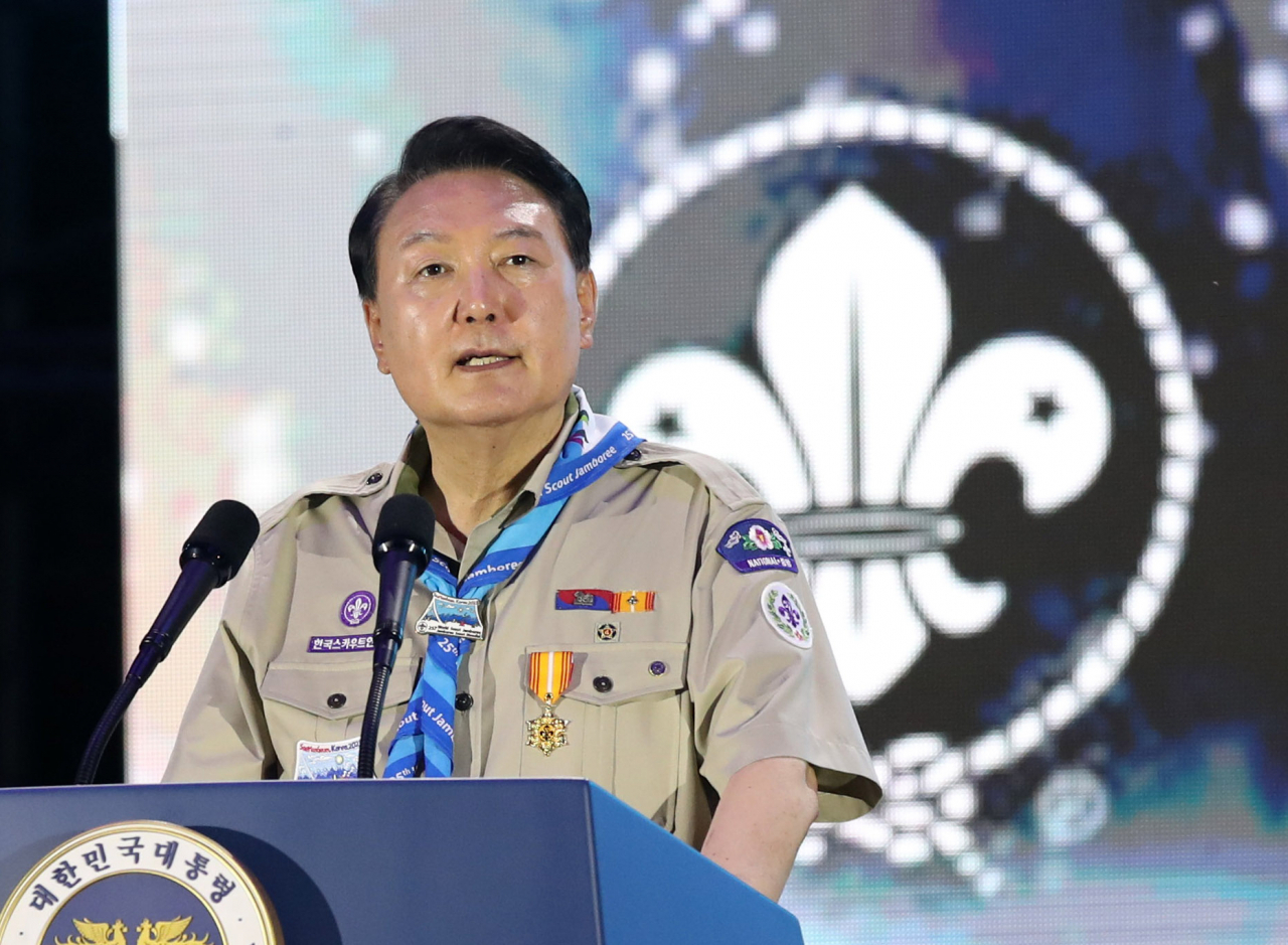 President Yoon Suk Yeol delivers a welcoming speech during the opening ceremony of the 25th World Scout Jamboree in Saemangeum, about 180 kilometers southwest of Seoul, on the night of Aug. 2. (Presidential office)