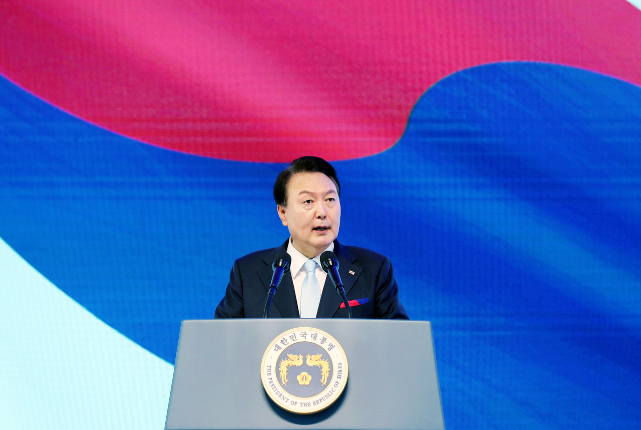 President Yoon Suk Yeol give a speech at the auditorium of Ewha Womans University in Seoul at the 78th Liberation Day on Tuesday. (Yonhap)