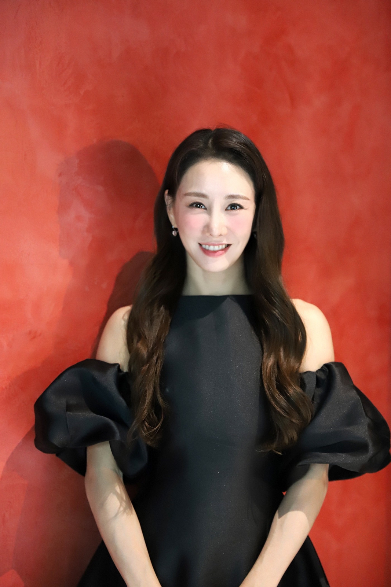 Musical stage actor Kim So-hyang, also known as Sophie Kim, poses for photos during an interview at the headquarters of EMK Musical Company in Seoul on Tuesday. (EMK Entertainment)