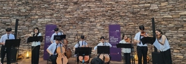Members of The Past 4 Present stage an ensemble performance in the 