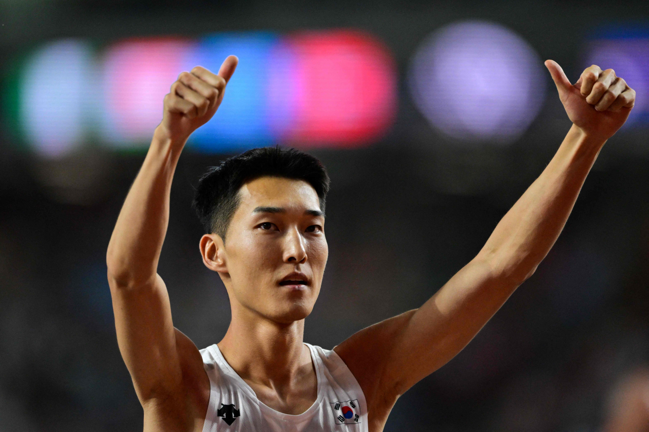 Woo Sang-hyeok of South Korea reacts after an attempt during the men's high jump final at the World Athletics Championships at the National Athletics Centre in Budapest on Tuesday. (EPA )