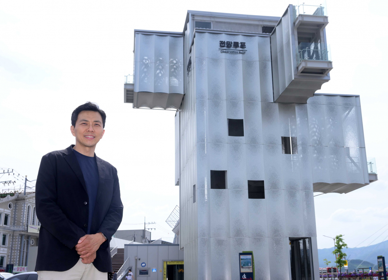 Cheon Jang-hwan stands in front of Thousand Plateaus, an observatory in Chuncheon. (Lee Sang-sub/ The Korea Herald)