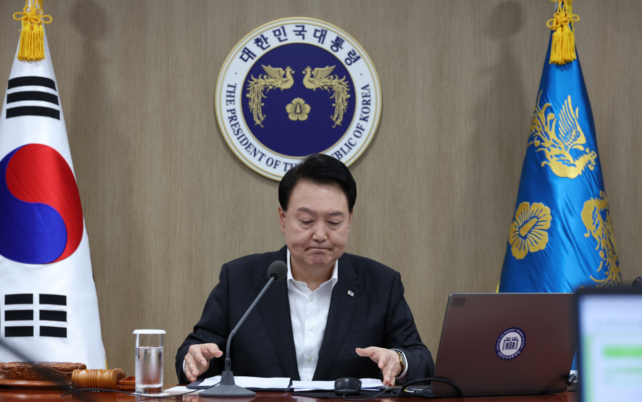 President Yoon Suk Yeol presides over the Cabinet meeting held in Yongsan, central Seoul, Tuesday. The Cabinet approved the proposal for 2024 budget. (Yonhap)