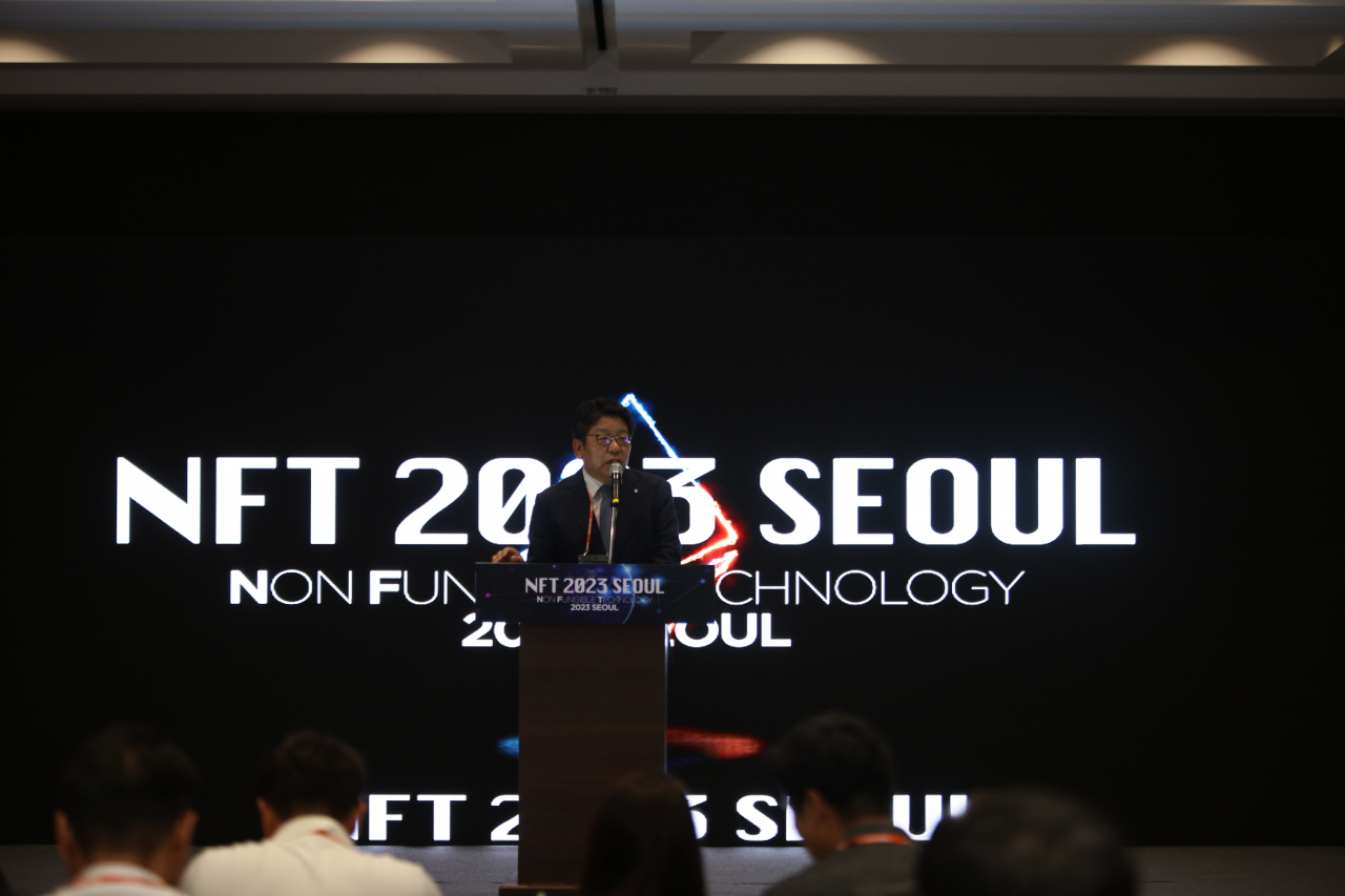 The Korea Herald CEO Choi Jin-young delivers a congratulatory speech during the NFT 2023 Seoul Conference, held at Coex in southern Seoul, Friday. (ArtToken)