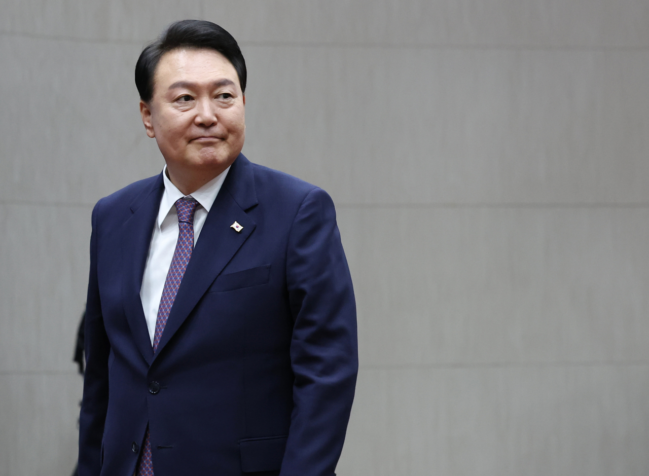 President Yoon Suk Yeol attends a ceremony at the Korea National Diplomatic Academy in Seoul on Friday to celebrate the 60th anniversary of the academy's foundation. (Yonhap)