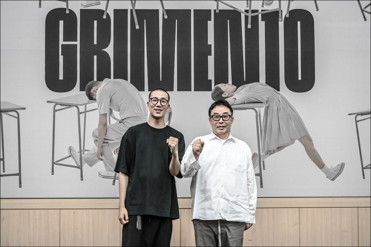 Choreographer Kim Sung-hoon (left) and visual director Jung Ku-ho pose for a photo after a rehearsal. (Sejong Center for the Performing Arts)