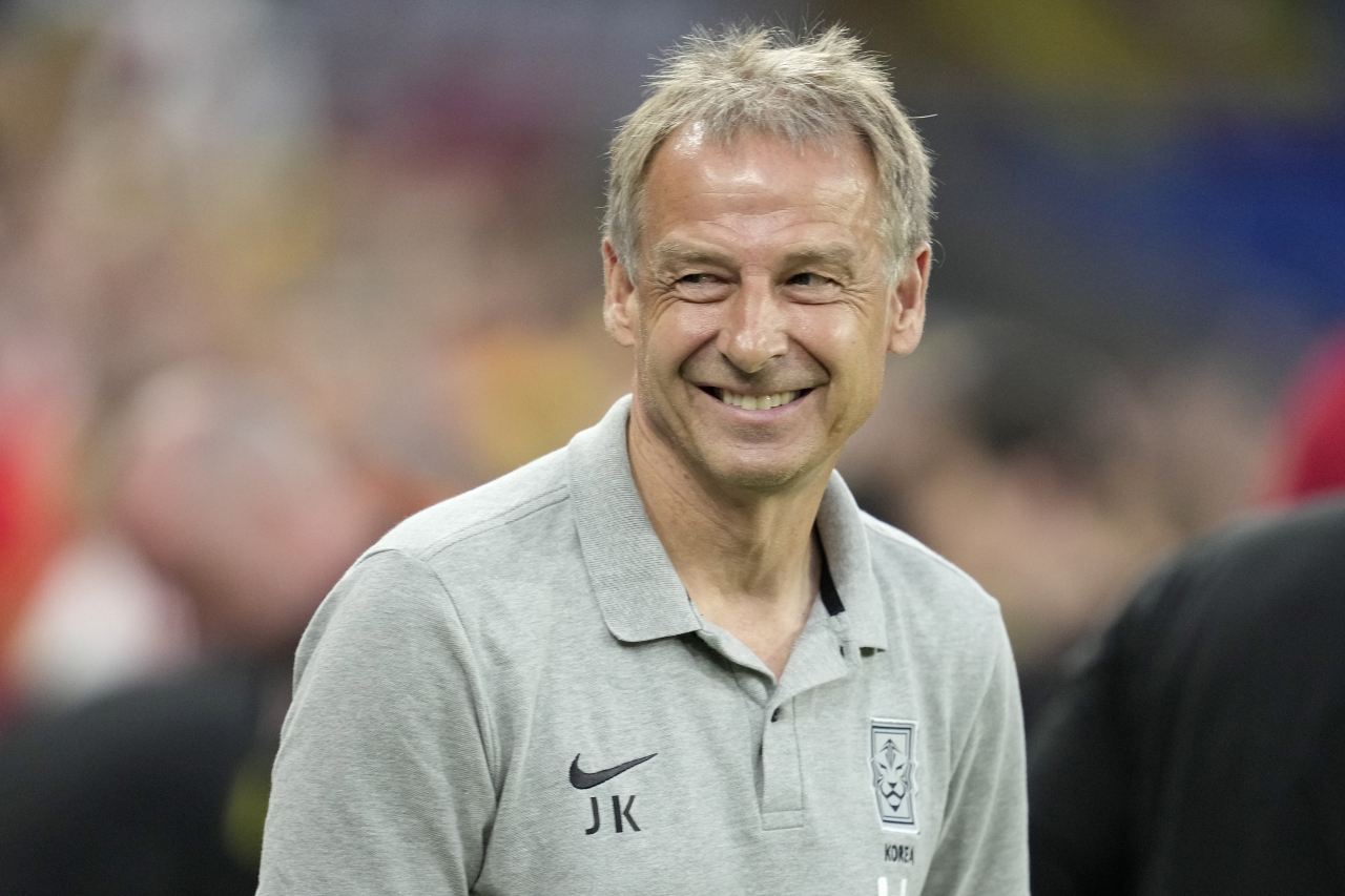 South Korea head coach Jurgen Klinsmann smiles during a friendly football match against Wales at Cardiff City Stadium in Cardiff on Thursday. (Yonhap)
