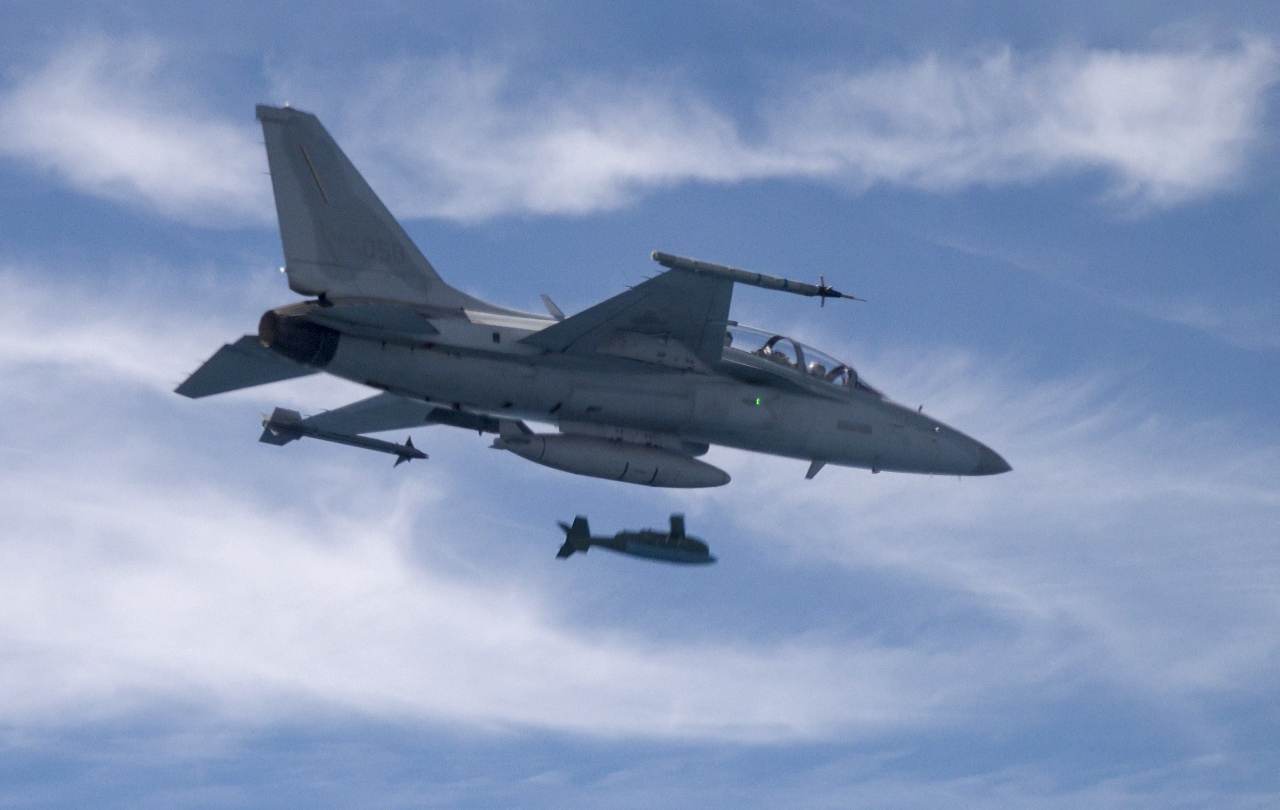 A South Korean F-15K fighter jet fires a GBU-56 air-to-surface missile at a target in the Yellow Sea on August 31, in this photo provided by the Air Force.