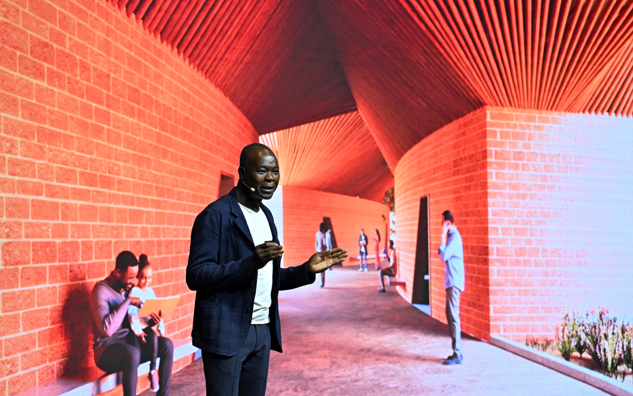 Diébédo Francis Kéré, the winner of the Pritzker Architecture Prize 2022, talks during The Herald Design Forum 2023 on Tuesday at The Shilla Seoul. (Im Se-jun/The Korea Herald)