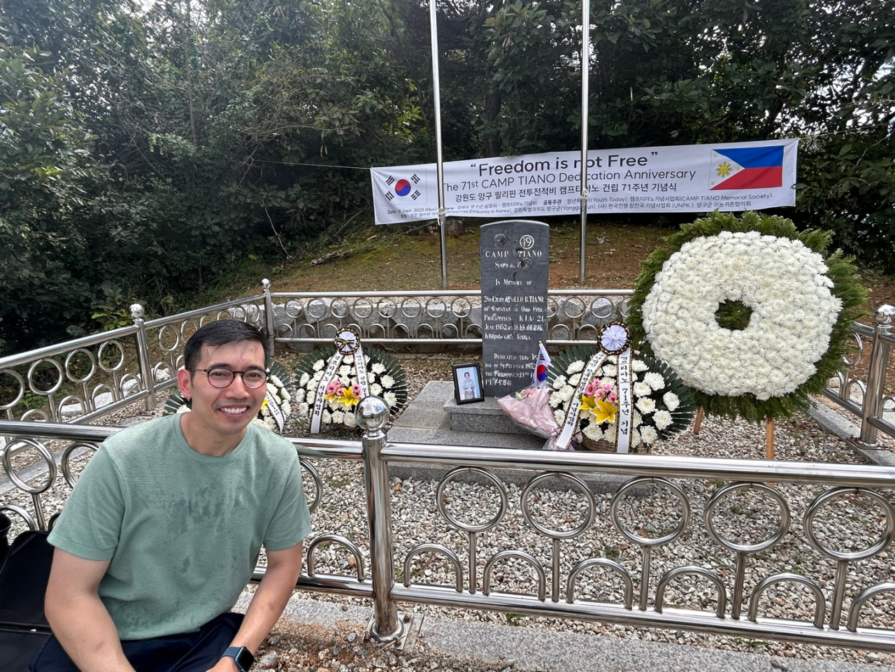 Merz Panares Lim, a bereaved family member of Lt. Apollo Tiano, poses for a photo next to the Camp Tiano War Memorial during a commemoration ceremony in Yanggu-gun, Gangwon Province, Monday. (Courtesy of Jenny Yoon)