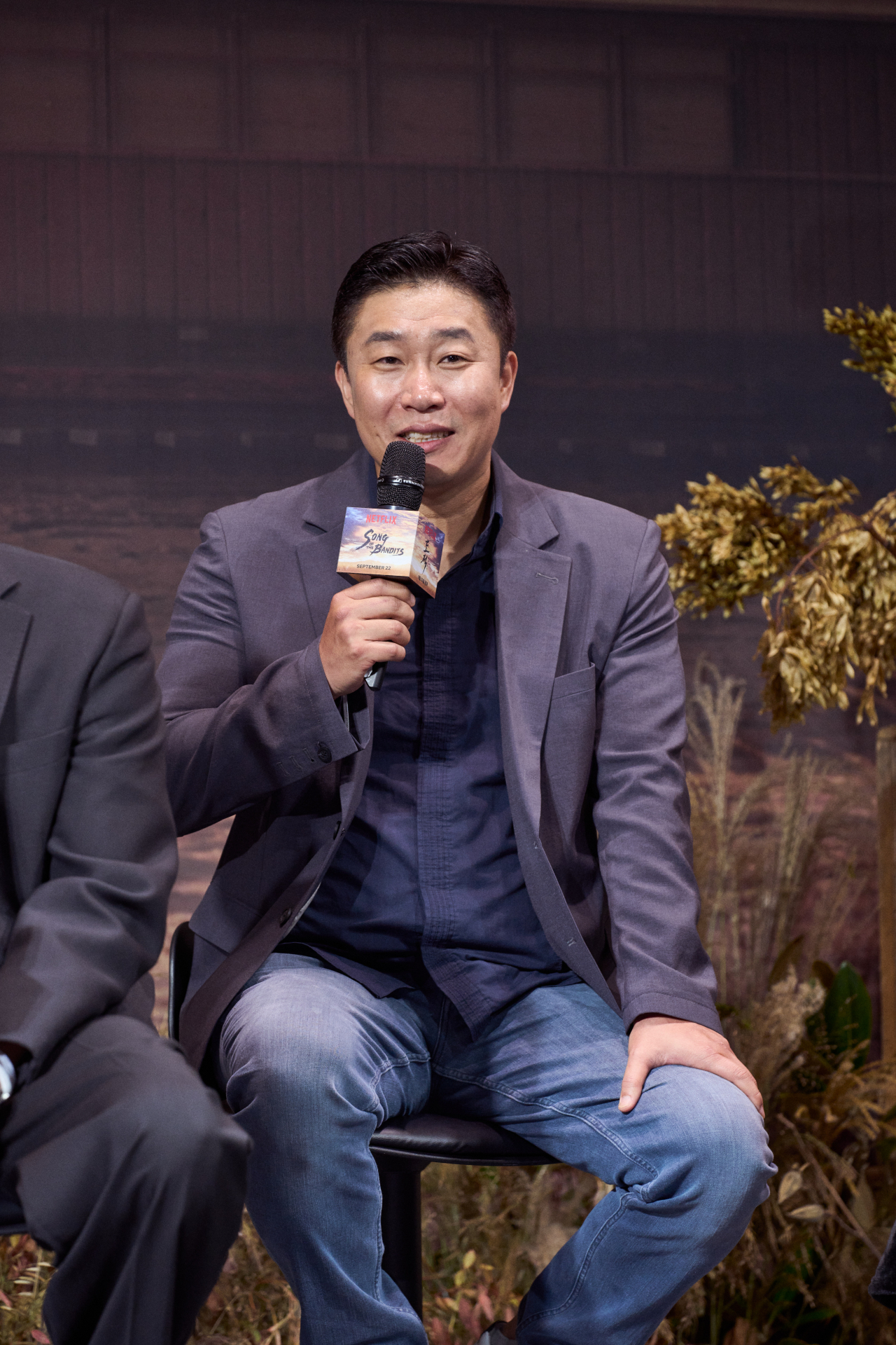 Director Hwang Jun-hyuk speaks in a press conference held at the Ambassador Seoul – A Pullman Hotel in Jung-gu, central Seoul, Tuesday. (Netflix)