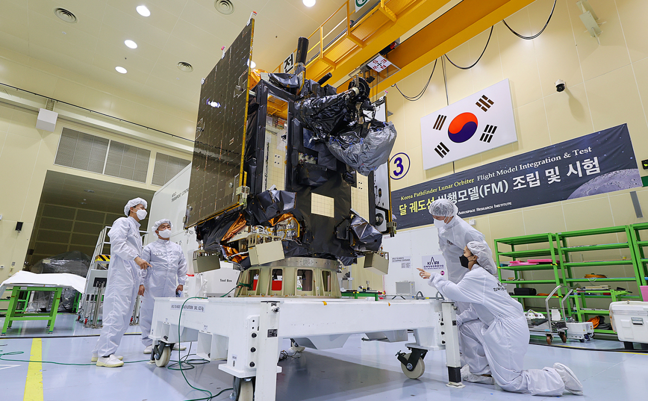 Researchers check up on Danuri, formally known as the Korea Pathfinder Lunar Orbiter, at Korea Aerospace Research Institute in August 2022, ahead of the lunar orbiter's launch. (Korea Aerospace Research Institute)