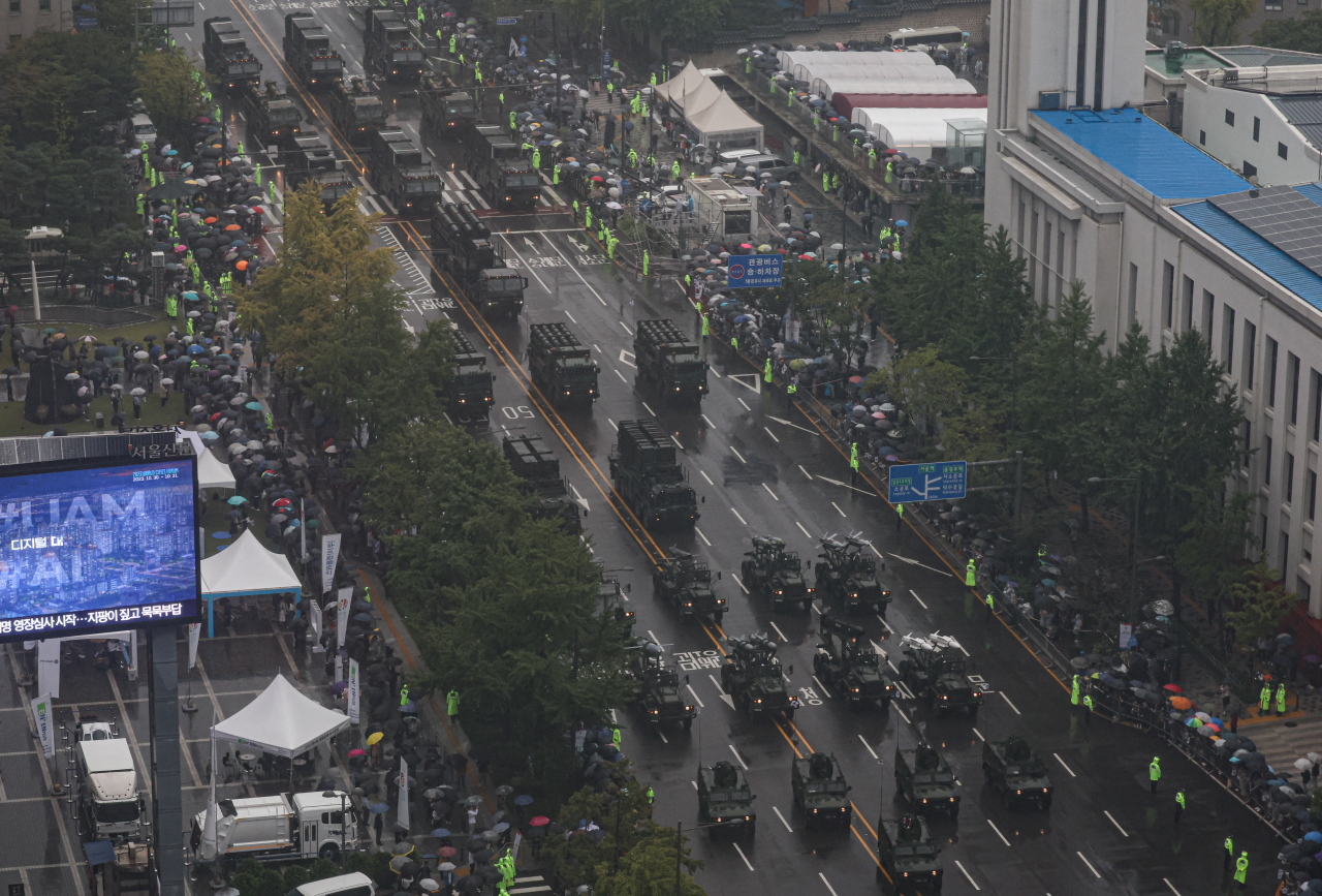 South Korea stages a military street parade in downtown Seoul amid rain on Tuesday in commemoration of the 75th anniversary of Armed Forces Day. (Yonhap - Joint Press Corps)