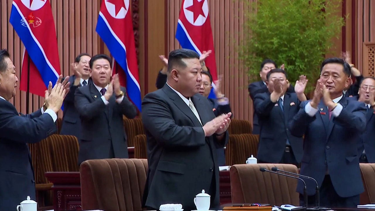 North Korean leader Kim Jong-un (center) claps during the ninth session of the 14th Supreme People's Assembly held on Sept. 26-27 in Pyongyang, in this photo captured from Pyongyang's official Korean Central Television. (Yonhap)