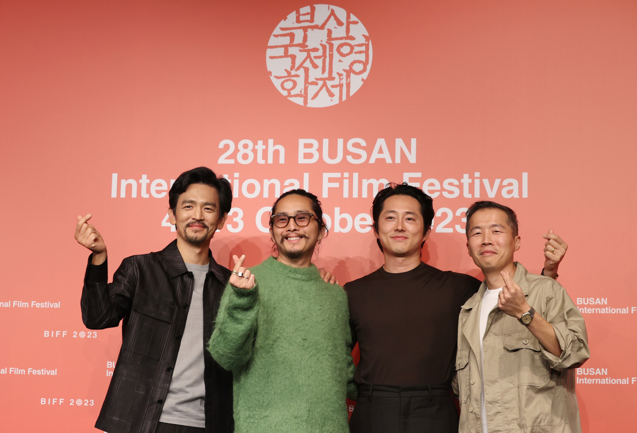 From left: John Cho, Justin Chon, Steven Yeun and Lee Isaac Chung pose after a press conference held at the 28th Busan International Film Festival’s newly established section, “Korea Diasporic Cinema,” at the KNN Theater in Busan, Friday. (Yonhap)