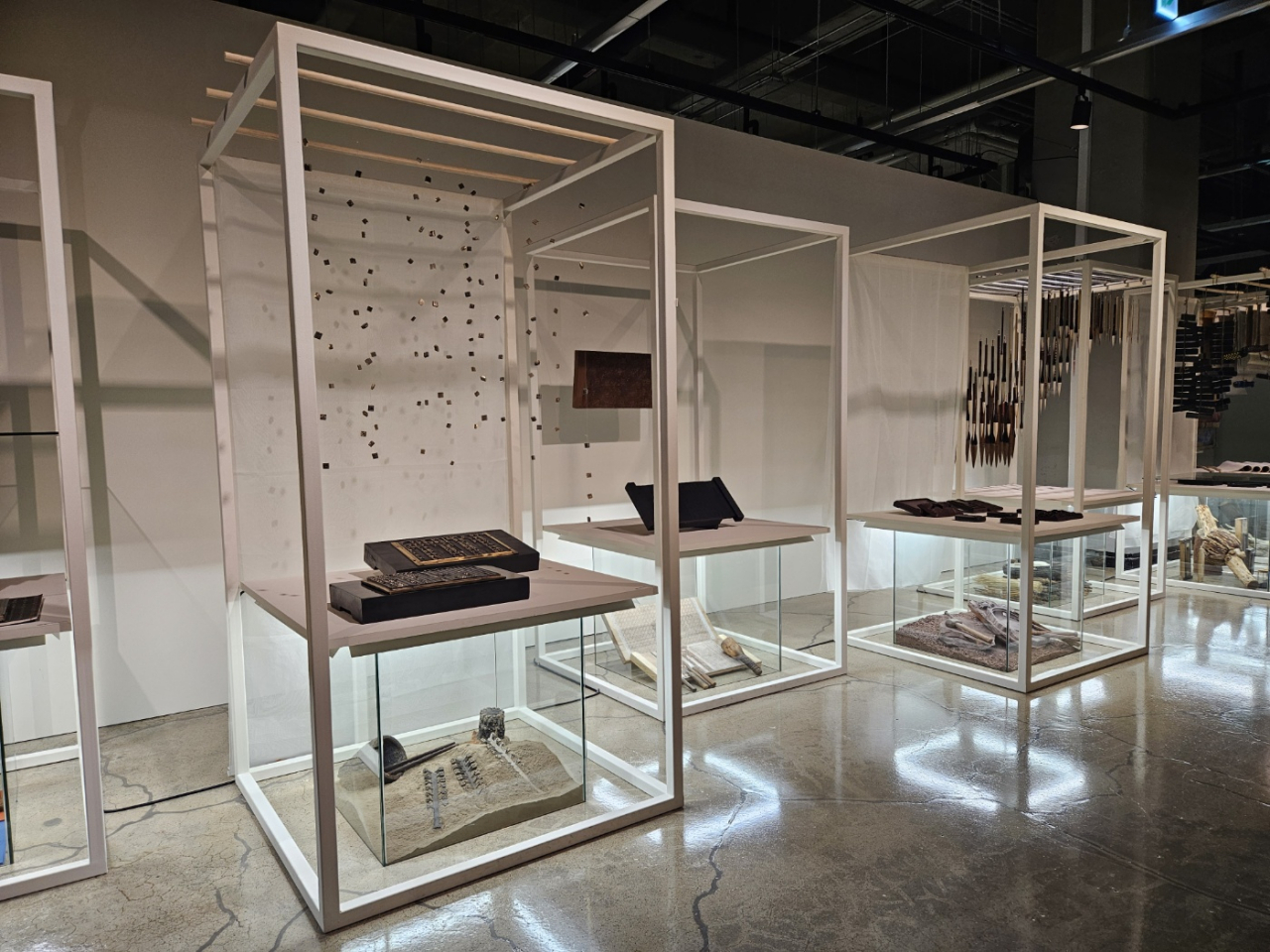 A section dedicated to master artisans of brush making, calligraphic engraving, red ocher ink stone making and producing Korean traditional paper, hanji, reflecting on the history of Jikji at the 2023 Cheongju Craft Biennale (Park Yuna/The Korea Herald)