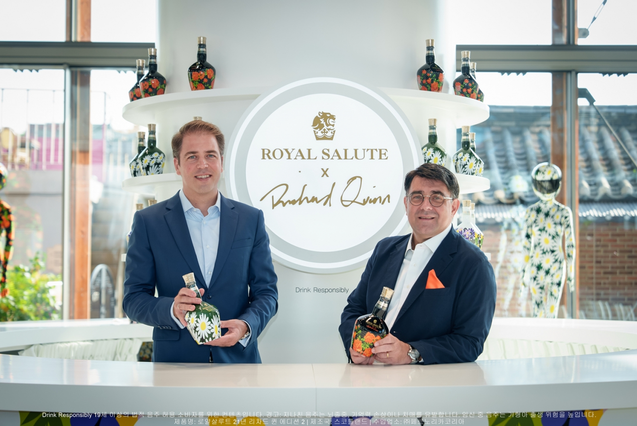 Pernod Ricard Korea CEO Frantz Hotton (right) and Marketing Director Miguel Pascual pose for a photo during the launch event of the Royal Salute 21-Year-Old Richard Quinn Edition 2 held in Seoul on Oct. 3. (Pernod Ricard Korea)