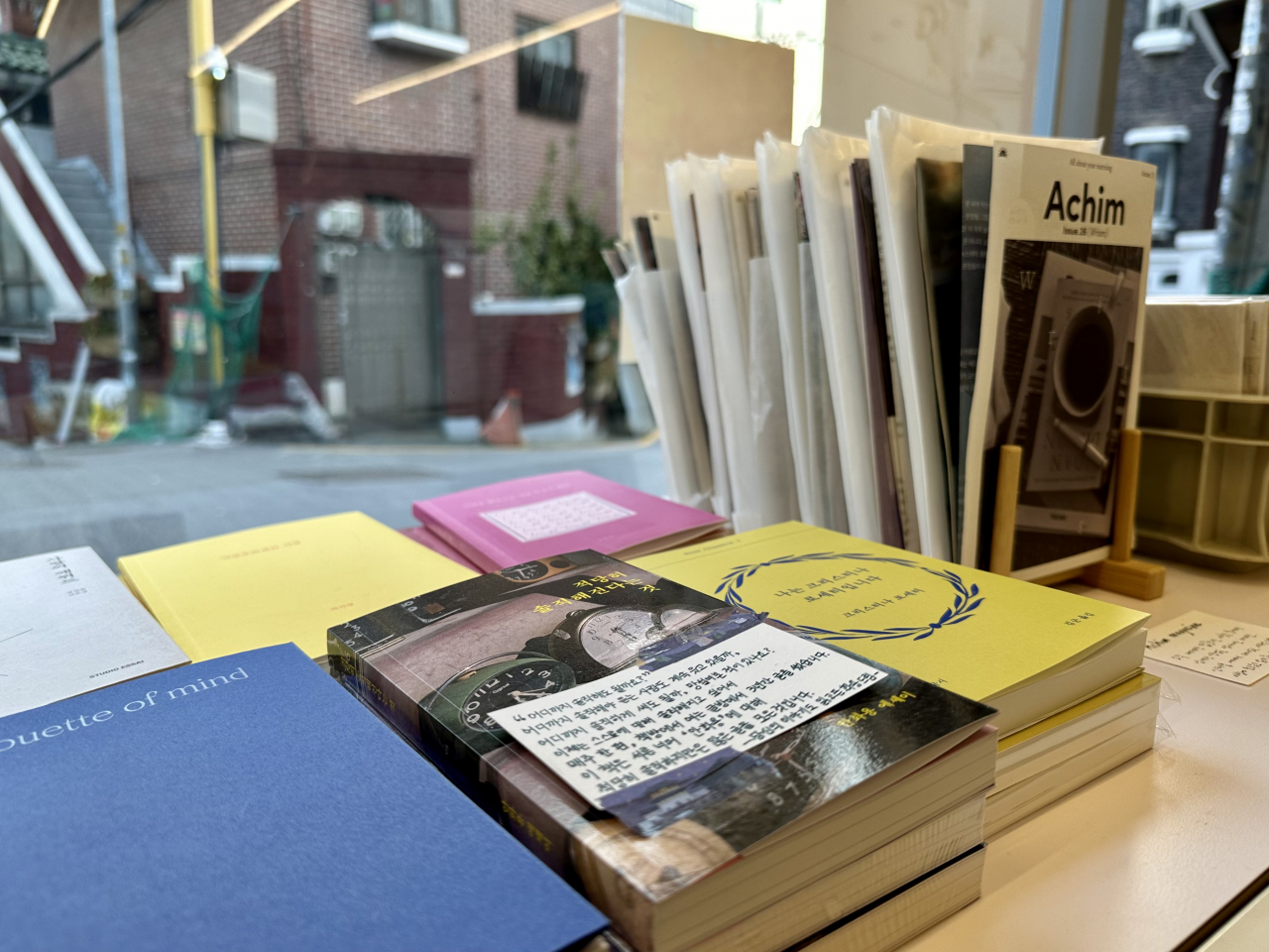 A selection of indie publications sits poised, with personal notes from authors at the indie bookstore Byeolcheck in Haebangchon, (Moon Joon-hyun/The Korea Herald)