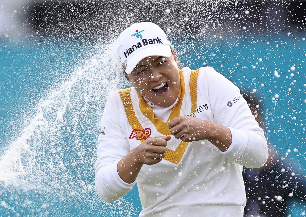 Minjee Lee of Australia is doused in champagne after winning the BMW Ladies Championship on the LPGA Tour at Seowon Hills at Seowon Valley Country Club in Paju, Gyeonggi Province, on Oct. 22, 2023. (Yonhap)